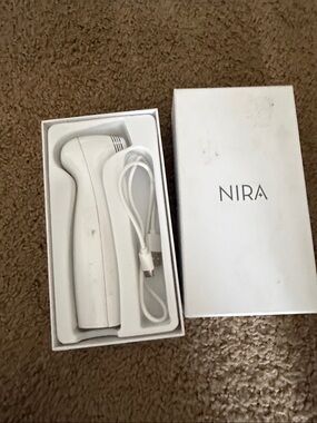 NIRA White Handheld Electronic Skincare Device